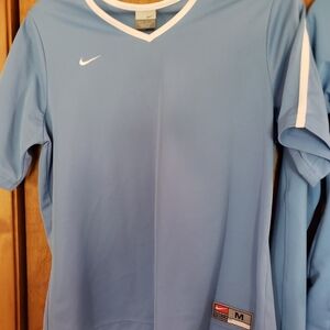 Nike Light Blue Short Sleeve Athletic Top with White Stripe On Sleeves